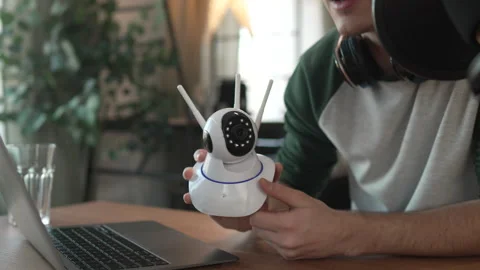 Close up of man blogger record video blog or v-log of home cctv camera Stock Footage 292561211