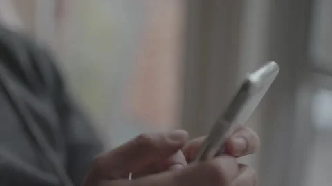 Close up of man bored at home texting Stock Footage 151469800