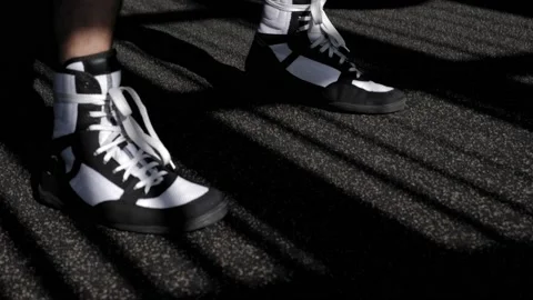 Close-up of a man in boxing sneakers training in the gym. Stock Footage 150266973
