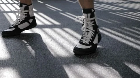 Close-up of a man in boxing sneakers training in the gym. Stock Footage 150344586