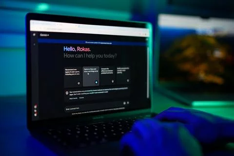Close-up of man chatting with google Gemini AI Chatbot on computer Stock Photos