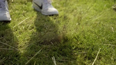 Close up of man chipping golf ball from rough grass Stock Footage 189301759