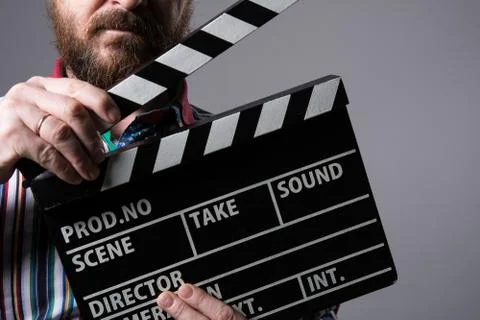 Close-up of a man clapperboard cinema Stock Photos