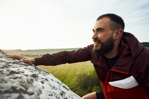 Close up of a man climbing the mountain Stock Photos