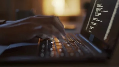 Close up man coder programmer typing programming code on computer keyboard. Stock Footage 334585878