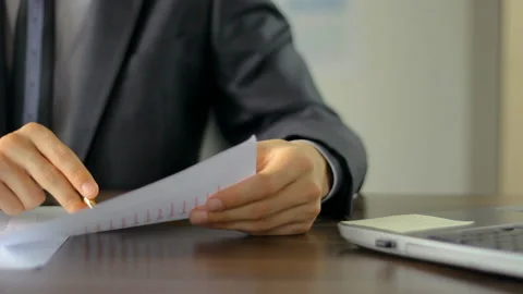 Close-up of a man comparing data Stock Footage 136719067