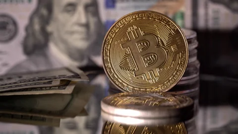 Close-up of Man Counting Out Dollars for Bitcoins Stock Footage 256215380