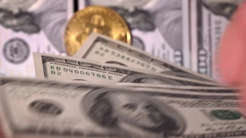 Close-up of Man Counting Out Dollars for Bitcoins Stock Footage 260478321