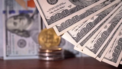 Close-up of Man Counting Out Dollars for Bitcoins Stock Footage 260478645