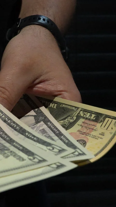 Close Up Of Man Counting US Dollar Banknotes In Gdynia Poland Stock Footage 339968013