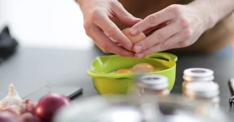 Close-up of man cracking an egg Stock Footage 80767492
