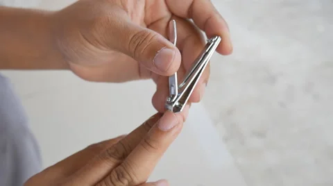 Close up of man to Cut fingernails Vídeo Stock 62310773