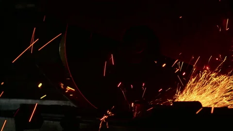 Close-up, A man cuts a metal part for a bulletproof vest from springs. homemade Stock Footage 178808435