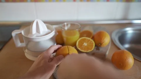 Close of Man Cutting Oranges with a Knife. Stock Footage 127249059