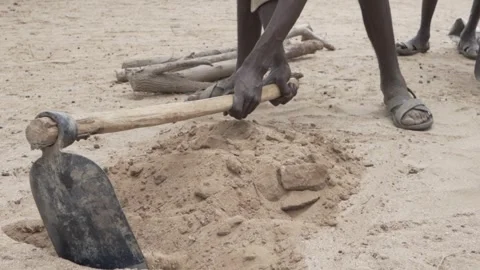 Close up of man digging sand from the ground. Stock Footage 319291225