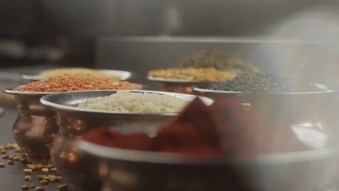 Close-up man dipping spoon in bowl of rice. Slow motion video Stock Footage 124957381