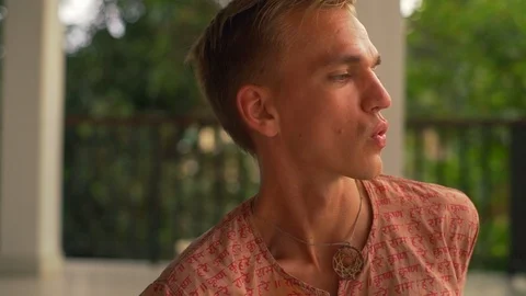 Close up man do back stretching yoga pose at balcony at sunset rapid slow motion Stock Footage 86652371