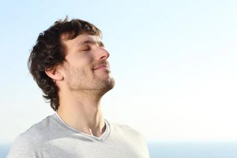 Close up of a man doing breath exercises outdoor Stock Photos