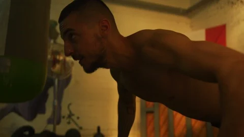 Close up of a man doing push-ups Stock Footage 100035918