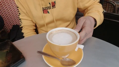 Close up of Man drinking Coffee in a cafe Stock Footage 126628248