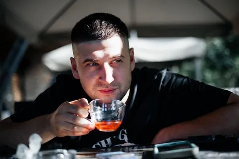 Close up of man drinking tea at   cafe Stock Photos
