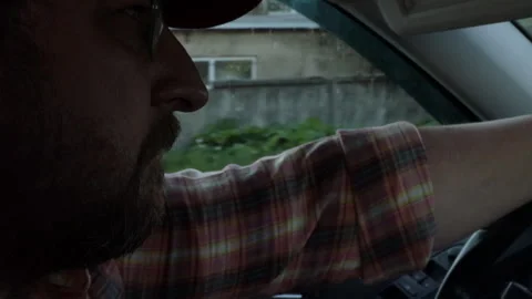Close-up of a man driving a car Stock Footage 276722522