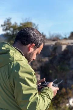 Close-up of man driving remote control of drones. Stock Photos