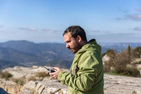 Close-up of man driving remote control of drones. Stock Photos