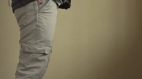 Close up of man dropping his hand while holding his medical mask. Stock Footage 134660204