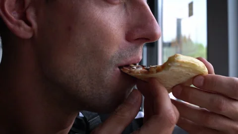 Close-up of man eating pizza Stock Footage 285210159