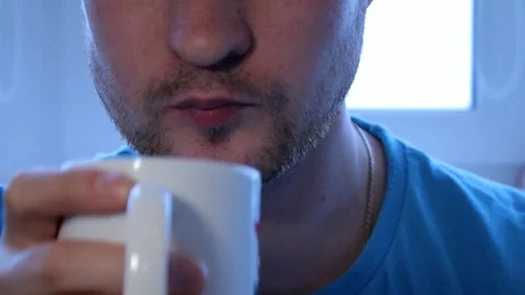 Close-up, man eats, fast food, a national dish, pie, unshaven man Stock Footage 94203778