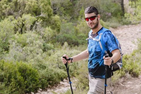 Close-up of a man equipped for trekking. Stock Photos