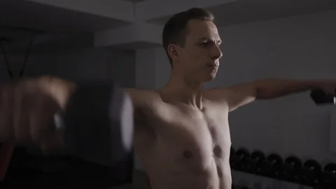 Close up of man exercising with dumbbell Stock Footage 102729922