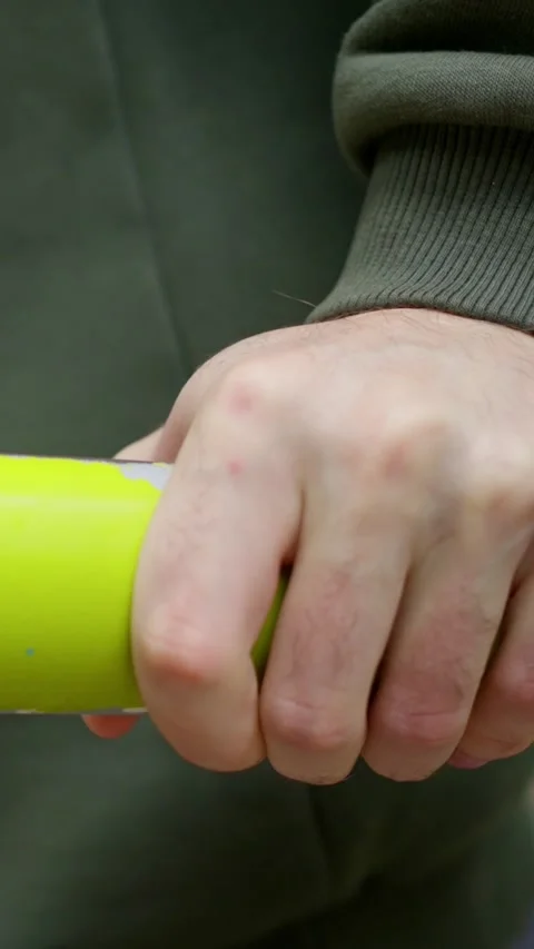Close up, A man exercising on the gymnastic bars in the park. doing push-ups Stock Footage 308722788