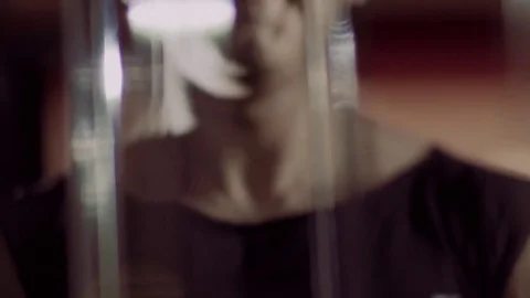 Close-up of a man exercising using fitness equipment Видео 72466976