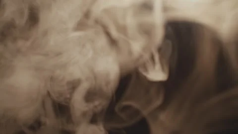 Close up man face with beard exhaling smoke clubs of white smoke on pastel Stock Footage 312478382
