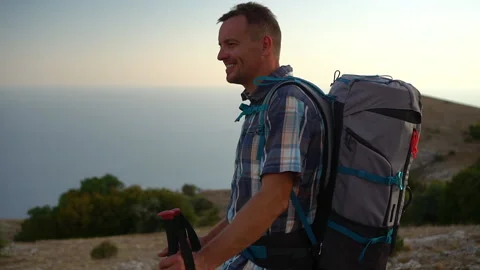 Close up of man face, portrait of handsome mountain hike travel hiker looking Stock Footage 141839208