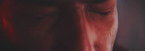 Close up of a man face while playing the trumpet Stock Footage 202320028