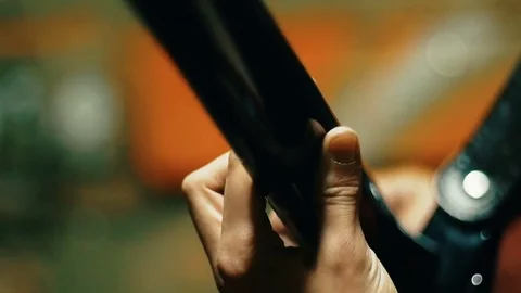 Close-up of man fingers touch the strings on the guitar. Video stock 77488457