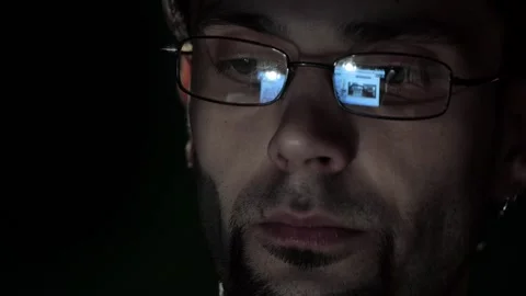 Close up of man in glasses browsing internet on smartphone Stock Footage 117165673