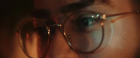 Close up of man in glasses talking Stock Footage 202264379