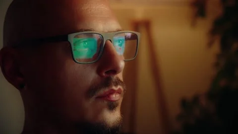 Close-Up of Man with Glasses Working Stock Footage 293139053