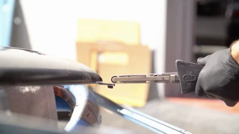 Close-up Of A Man With Gloves Working On A Car Stock Footage 129443969