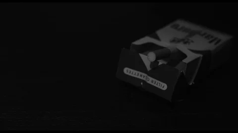 Close-Up of Man Grabbing a Cigarette Stock Footage 90237064