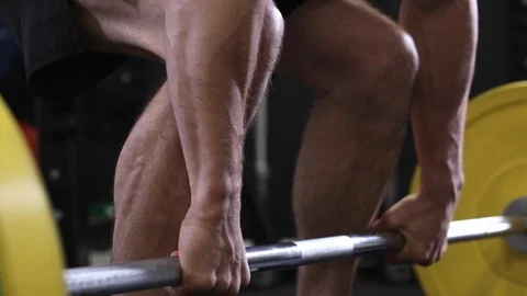 Close Up Of Man In Gym Lifting Heavy Weights On Bar Stock Footage 91156791
