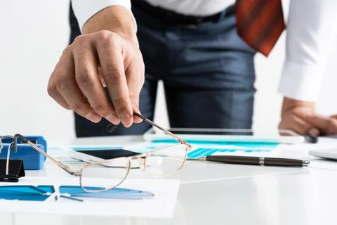 Close-up man hand with analytics Stock Photos