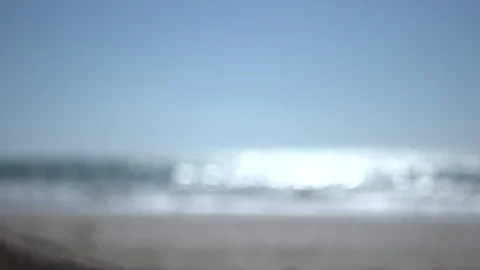 Close man hand at the beach, holding beach sand and open slowly Stock Footage 100166313