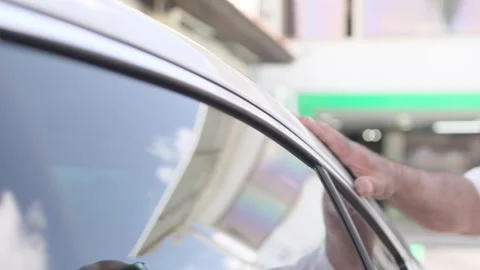 Close Up Man Hand Caressing White Car Roofline And Window Frame Stock-Footage 325780542