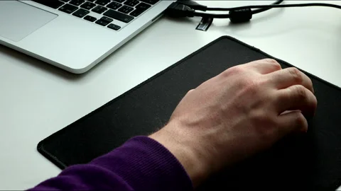 Close up man hand on computer mouse Stock Footage 150305084