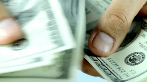 Close up of man hand counting 100 us dollar cash Macro shot male hands hold.. Stock Footage 272761882